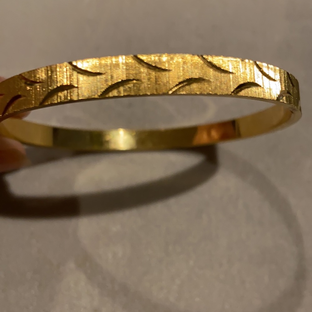 Crown Trifari M gold tone bangle bracelet